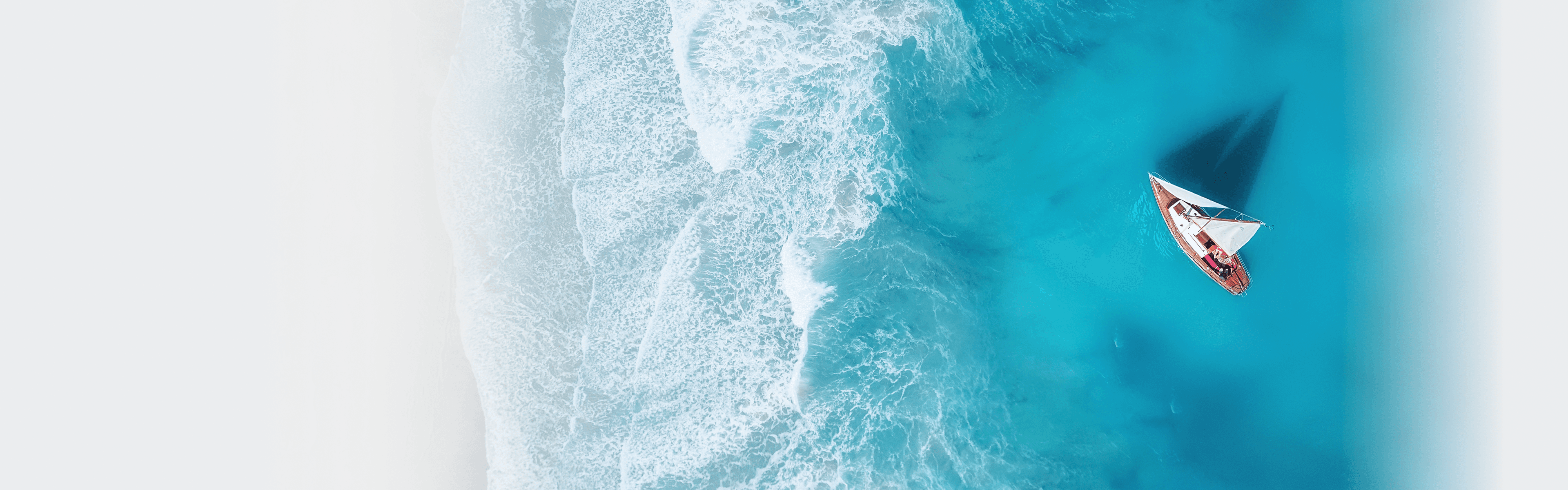Yacht on the water surface from top view